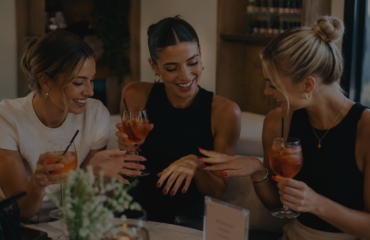 Girls having drinks and their nails done in Teddington, London, UK